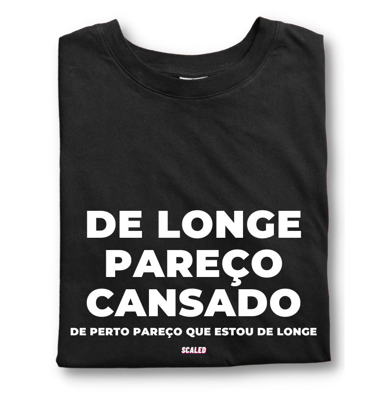 De longe pareço cansado